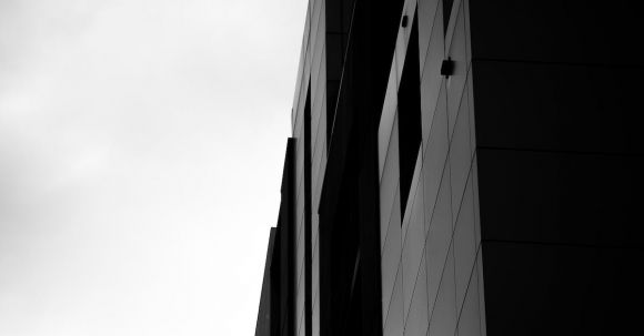 Property - Grayscale Photograph of High-rise Building