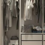 Closet - Assorted Clothes Hanged Inside Cabinet